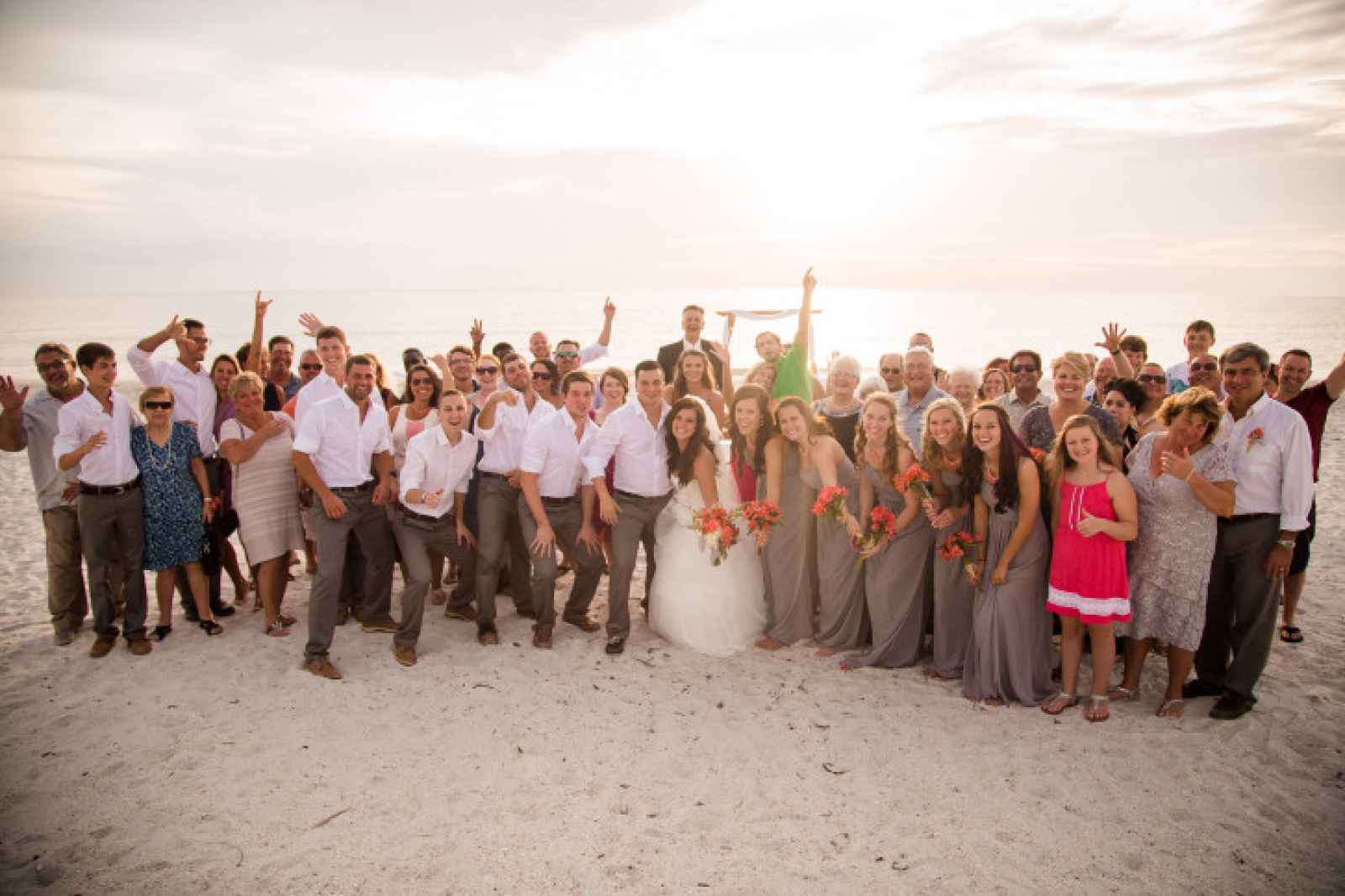 wedding guests on beach