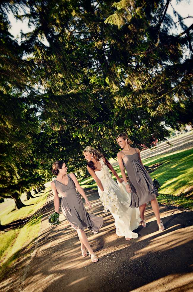 Bride Walking With Two Bridesmaids