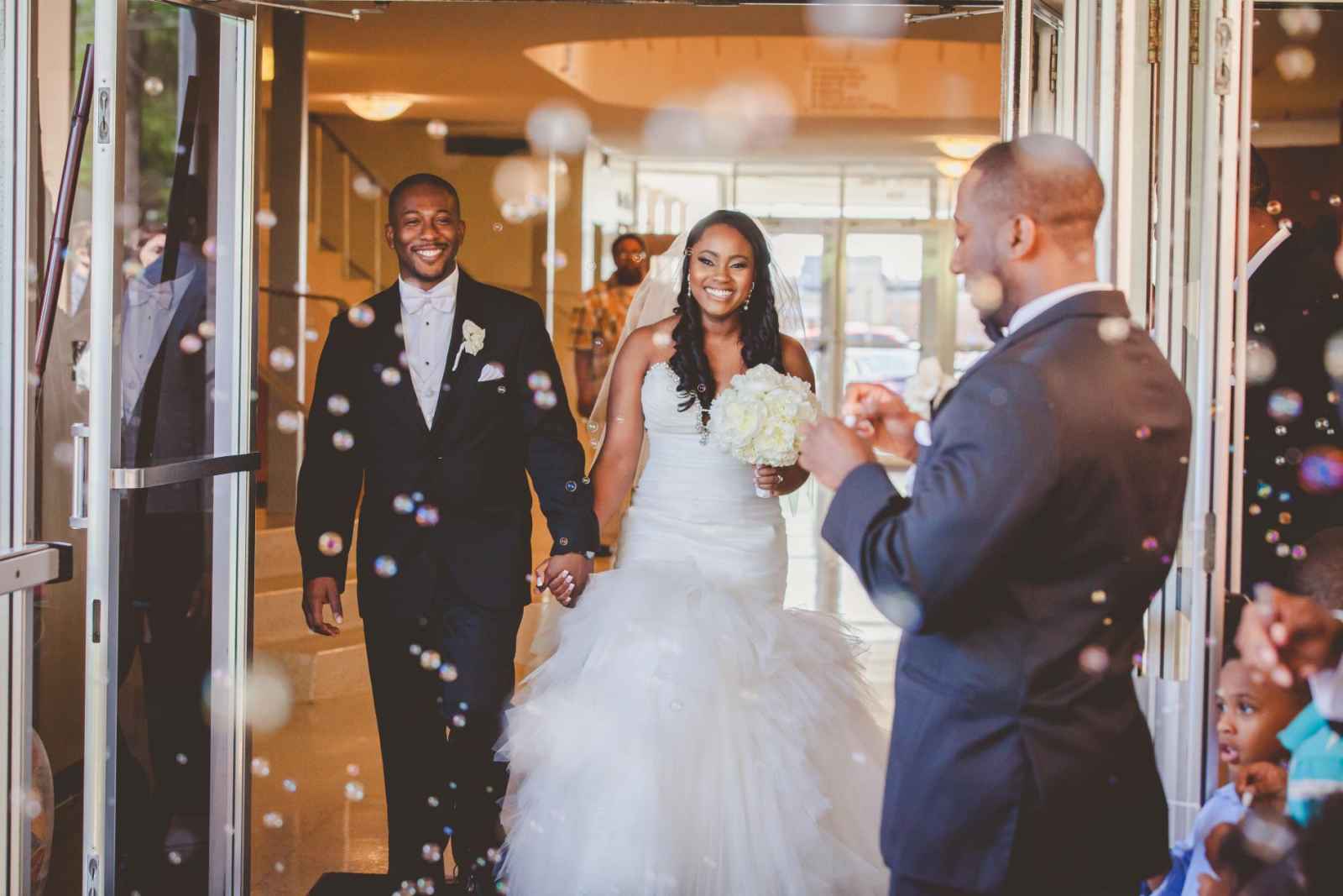 couple entering reception