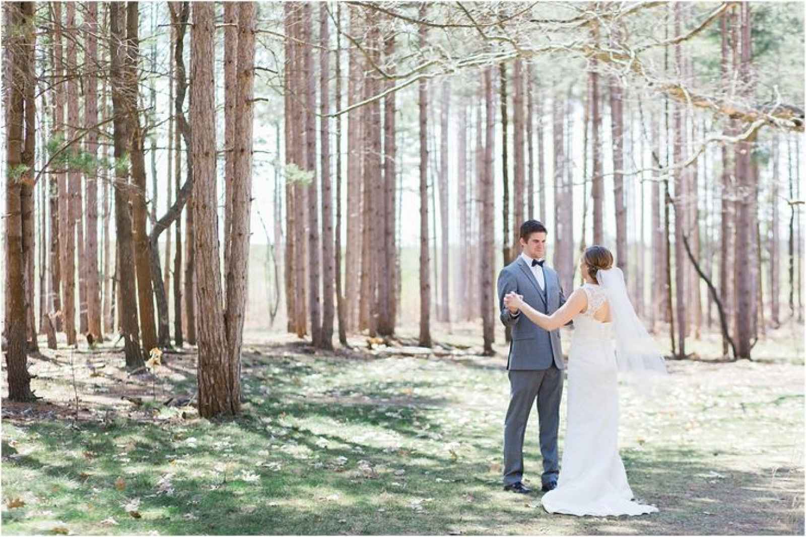bride and groom in woods