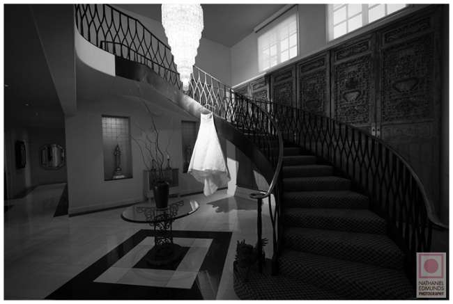 Wedding Gown Hanging on Staircase