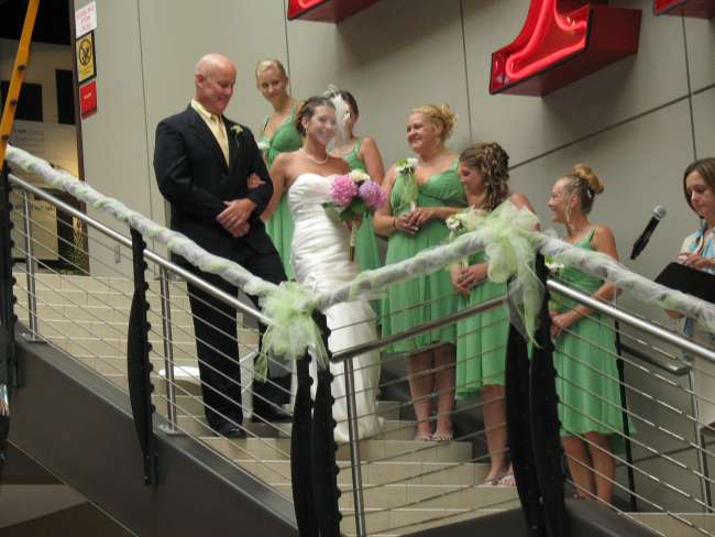 Bride's grand entrance down staircase