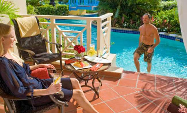 Sunny patio overlooking pool