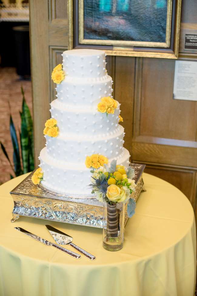 Simple White Cake with Yellow Flowers