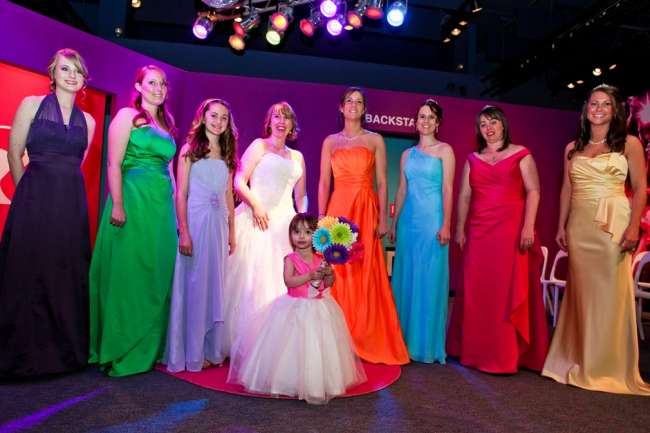 Bridal party featuring different colored dresses