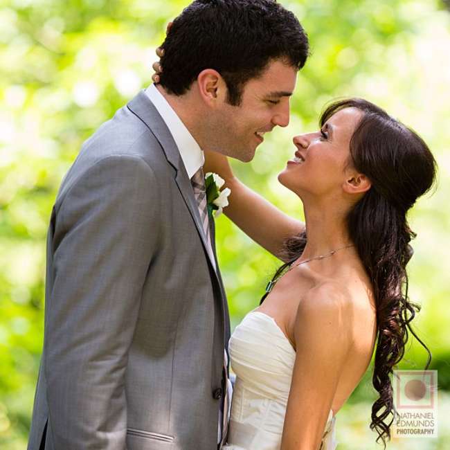 Bride and groom pose for photo