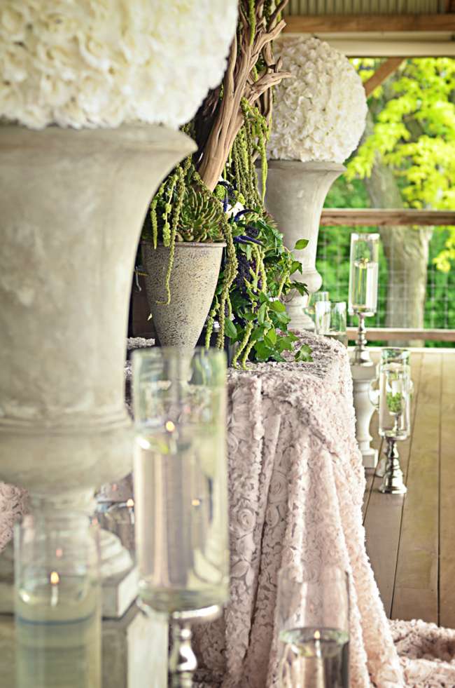 Large Floral Balls on Cement Urns