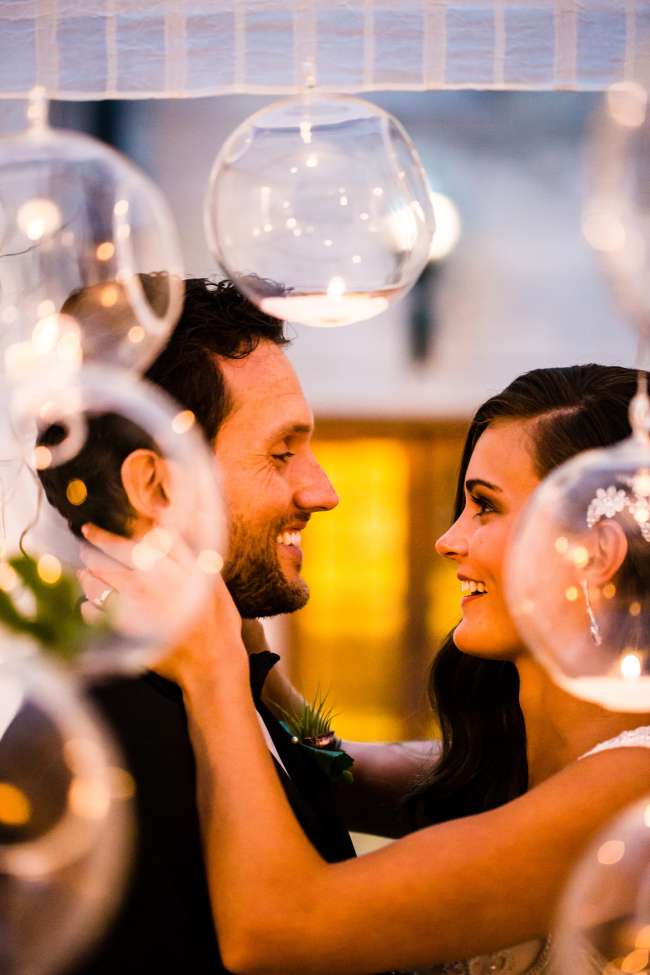 Bride & Groom Behind Floating Candles