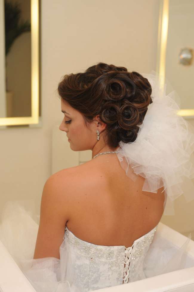 Bride with strapless gown in updo