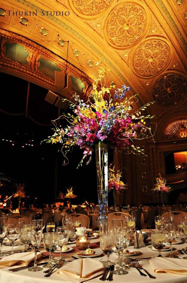 Table Centerpiece at Wedding Reception at Morris Performing Arts Center on platforming over theater seating