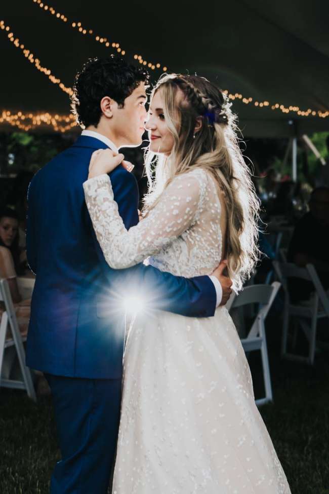 Beautiful wedding day first dance photo, professional lighting